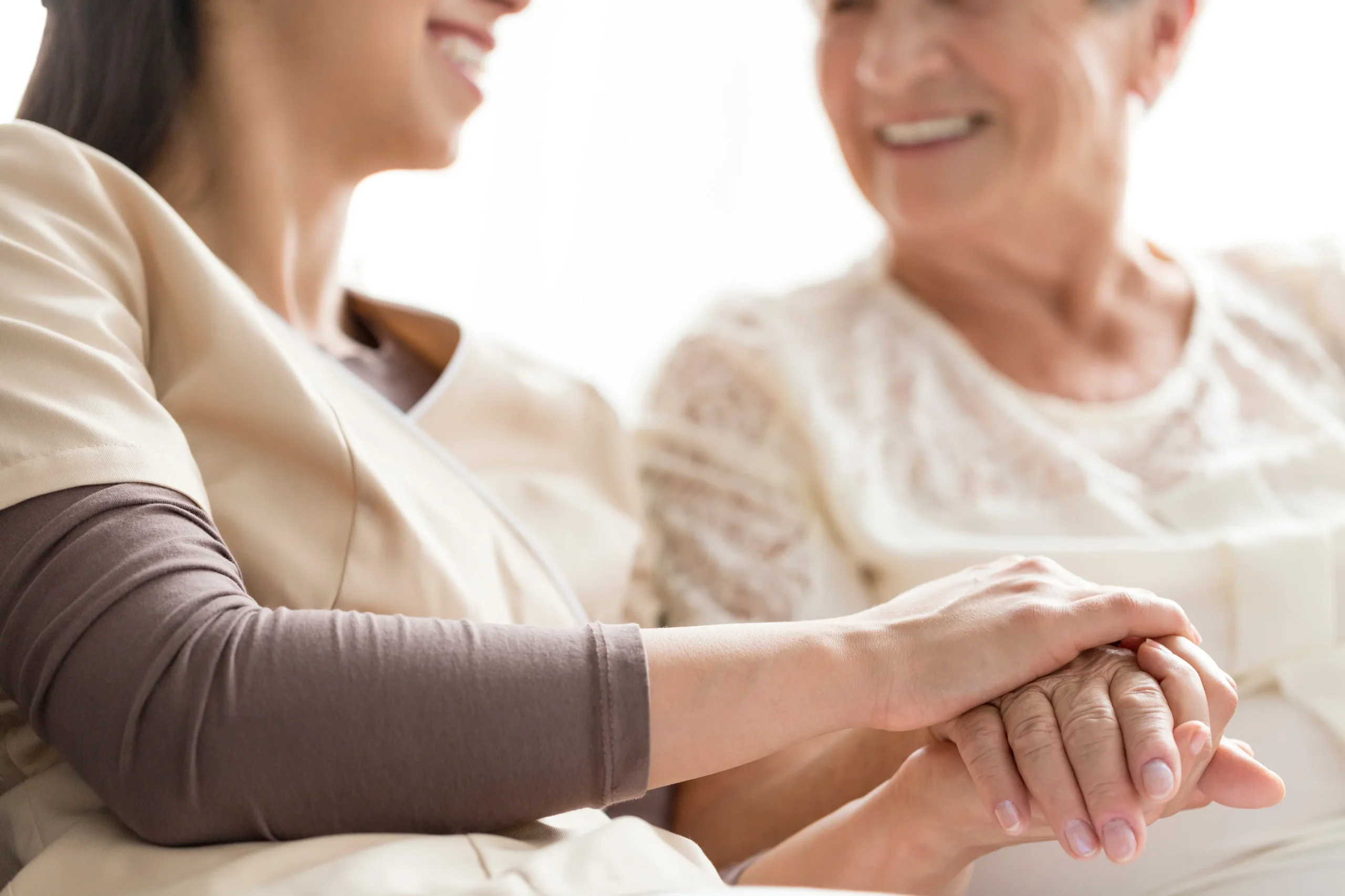 a woman holding a hand of a woman