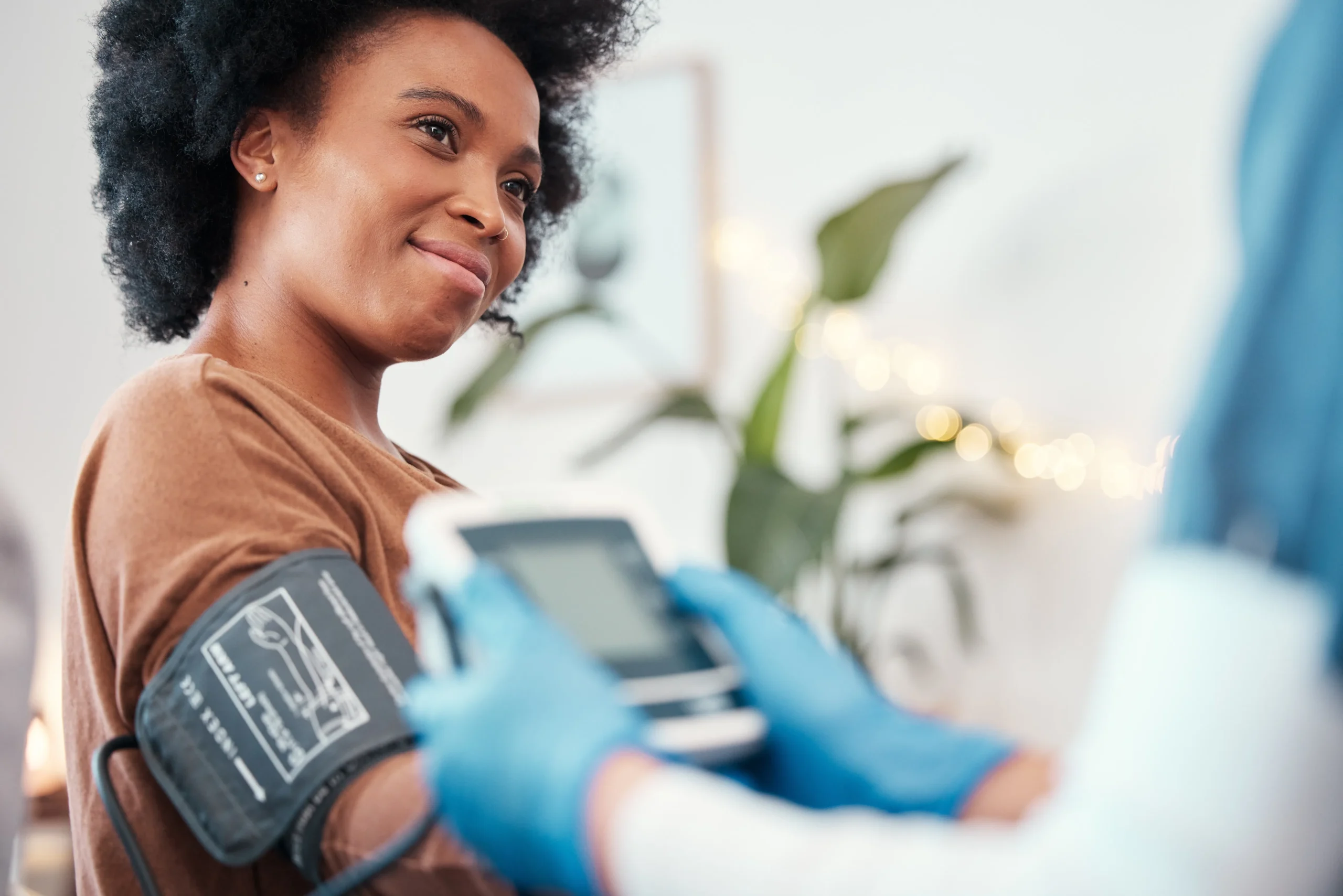 a woman with a blood pressure monitor