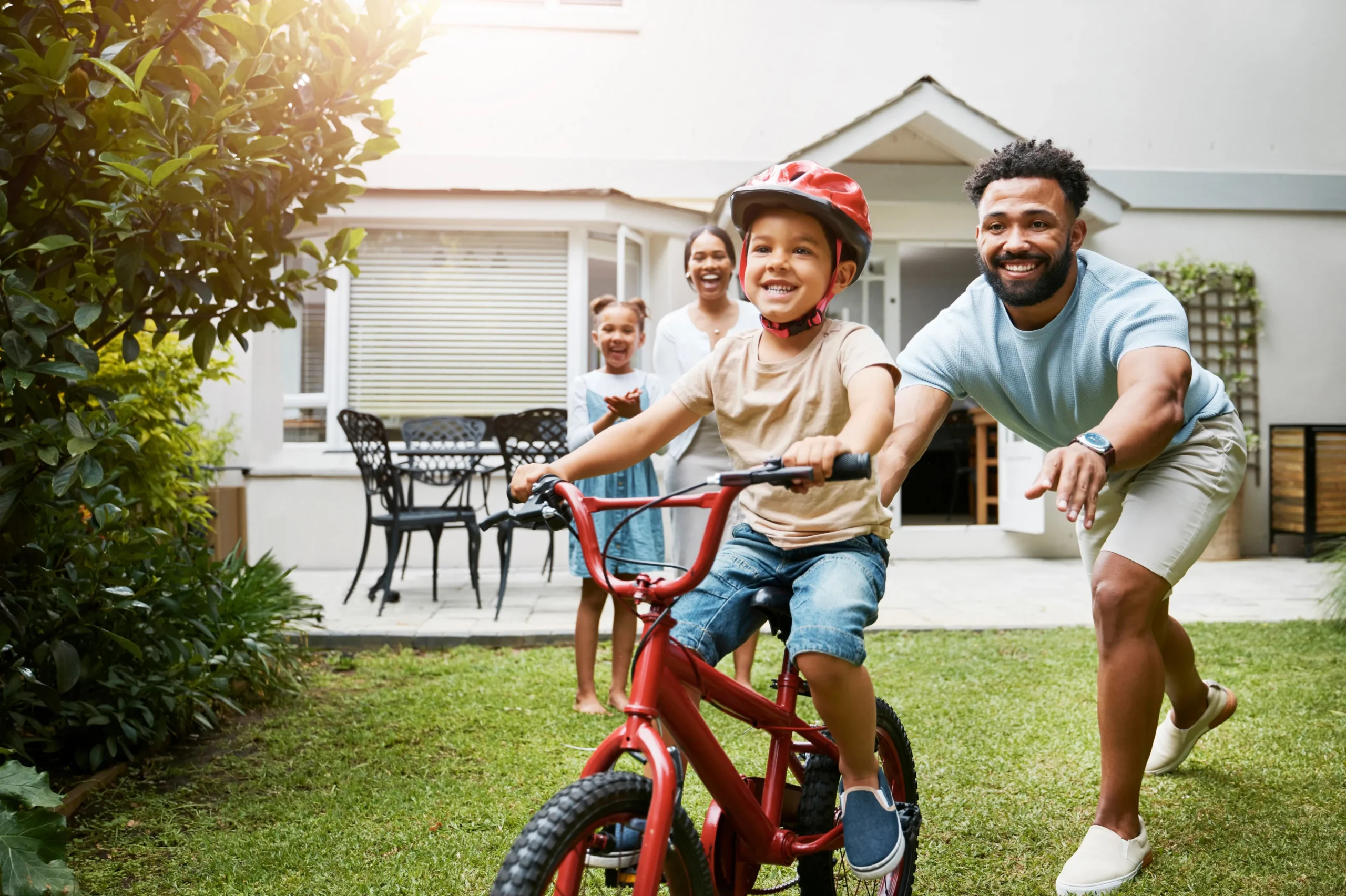 a man and child riding a bike -Acquired Brain Injury Treatment cover