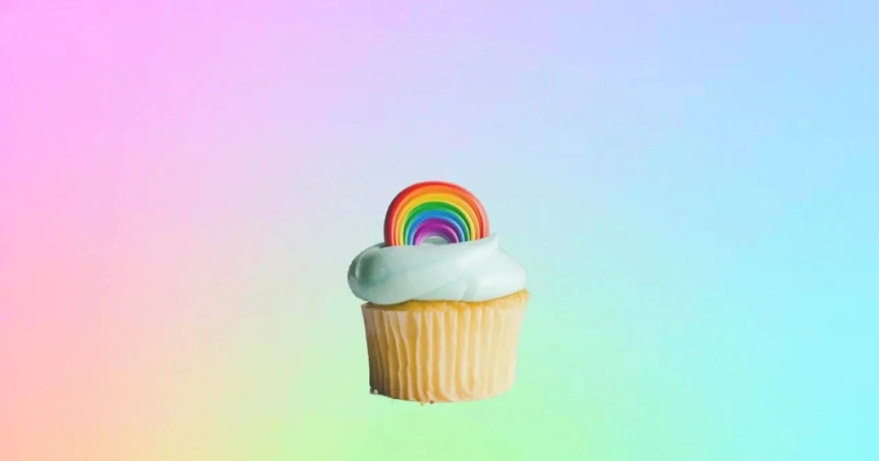 a cupcake with a rainbow on top