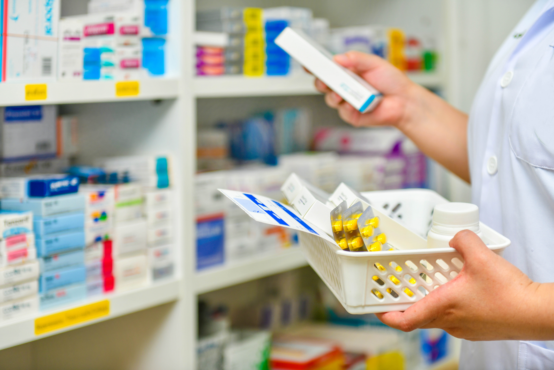 assured-healthcare-and-wellness-blog-when-prescribed-doesn-mean-risk-free-understanding-medication-and-overdose-pharmacist-picking-a-prescription